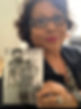 Picture of Ricki holding book.jpg