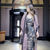 Thumbnail: Messenger silk midi skirt front view showing elegant silhouette and full-length drape in luxury silk fabric