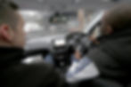 Boys driving in car