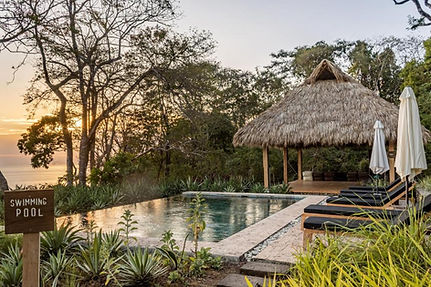 THEA Retreat Center swimming pool surrounded by tropical nature near Santa Teresa, Costa Rica