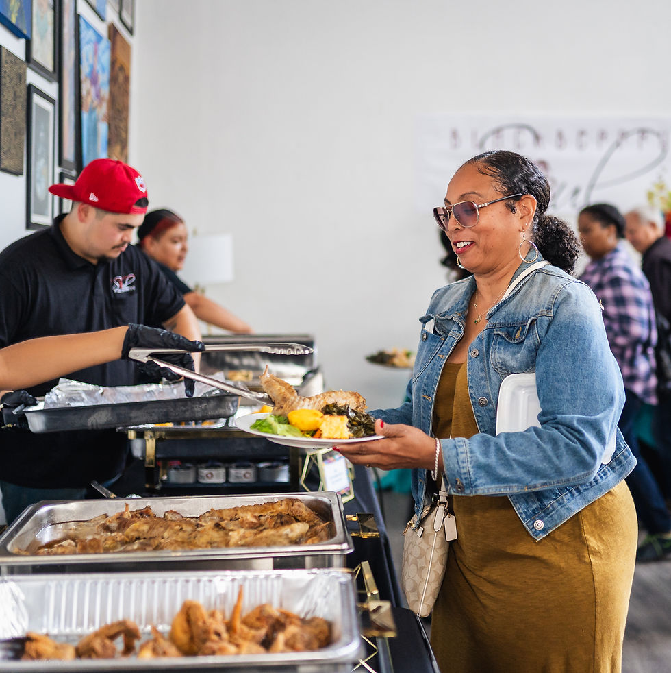 Guests at a catered celebration by Blackberry Soul Fine Catering