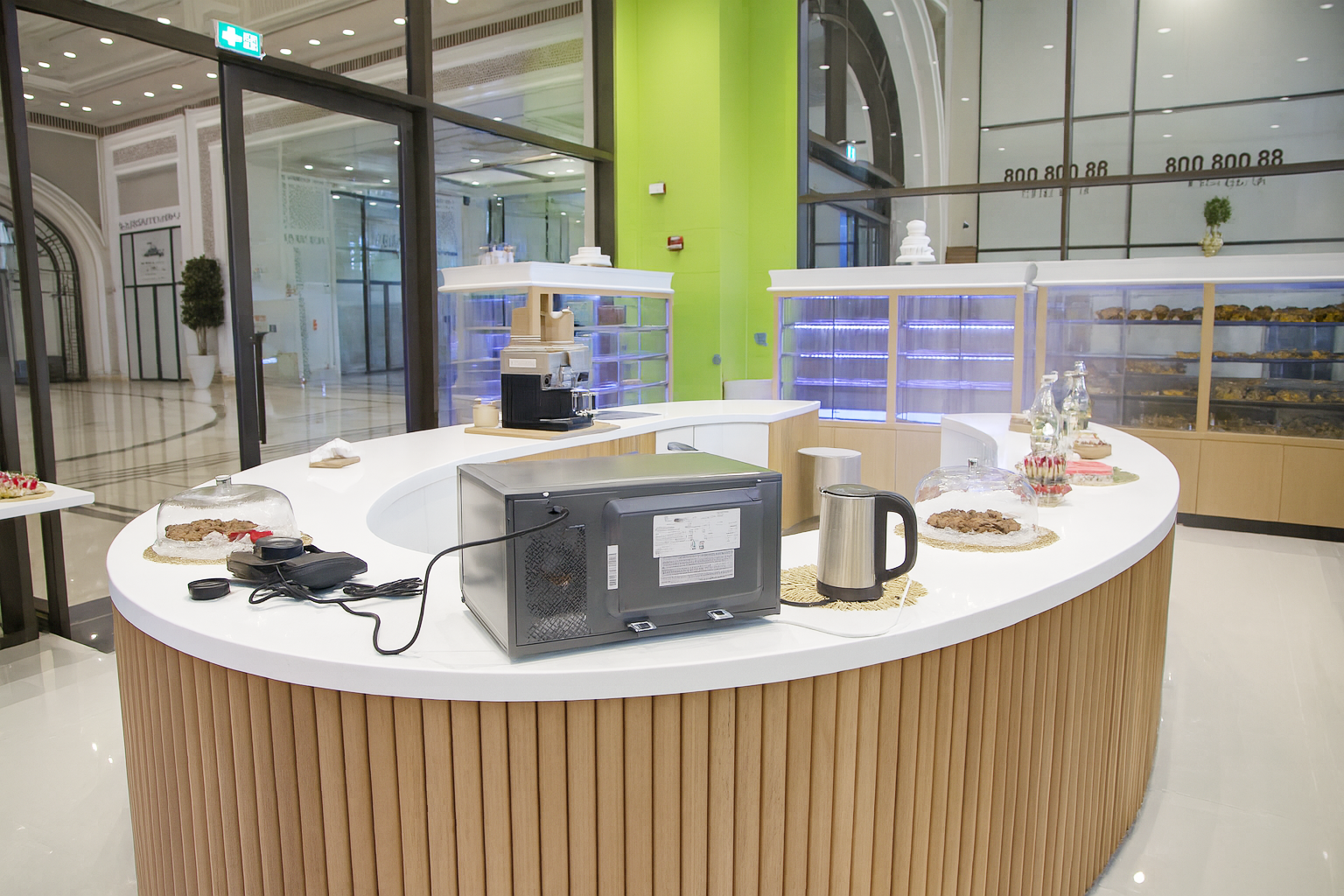 Latte art being poured into a ceramic cup