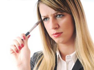 A woman with blond hair thingking. Paula Donnan Advisory,