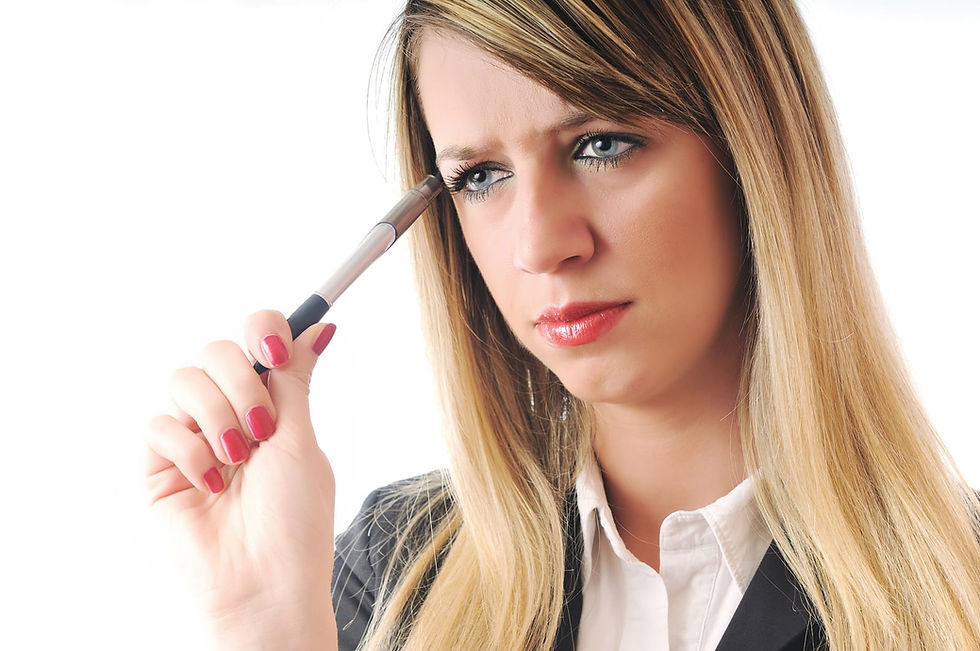 A woman with blond hair thingking. Paula Donnan Advisory,