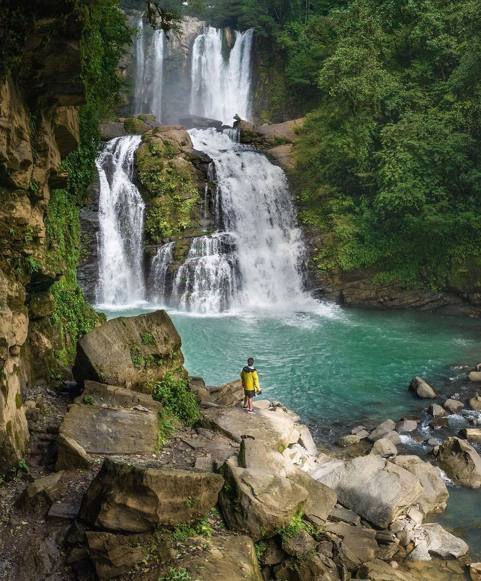 Large waterfall in a jungle setting
