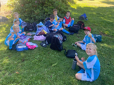 Lunch time at Skookum Summer Soccer Camps is for making friends and finding the shade
