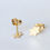 Thumbnail: Small gold stud earrings star of david unique handcrafted jewelry from Jerusalem on a white background