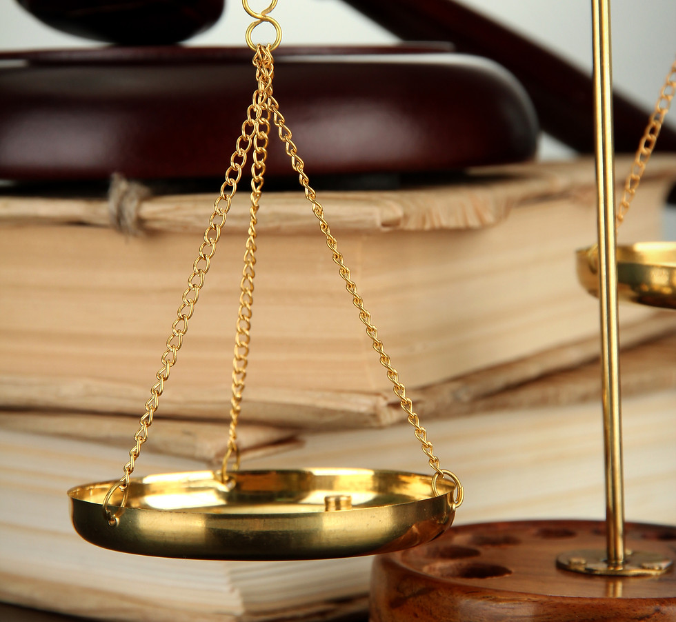 golden-scales-justice-gavel-books-grey-background_edited.jpg