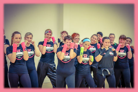 ladies taking part in a kickboxing class