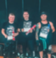 ADULT KICKBOXING STUDENTS RECIEVING THEIR BELTS