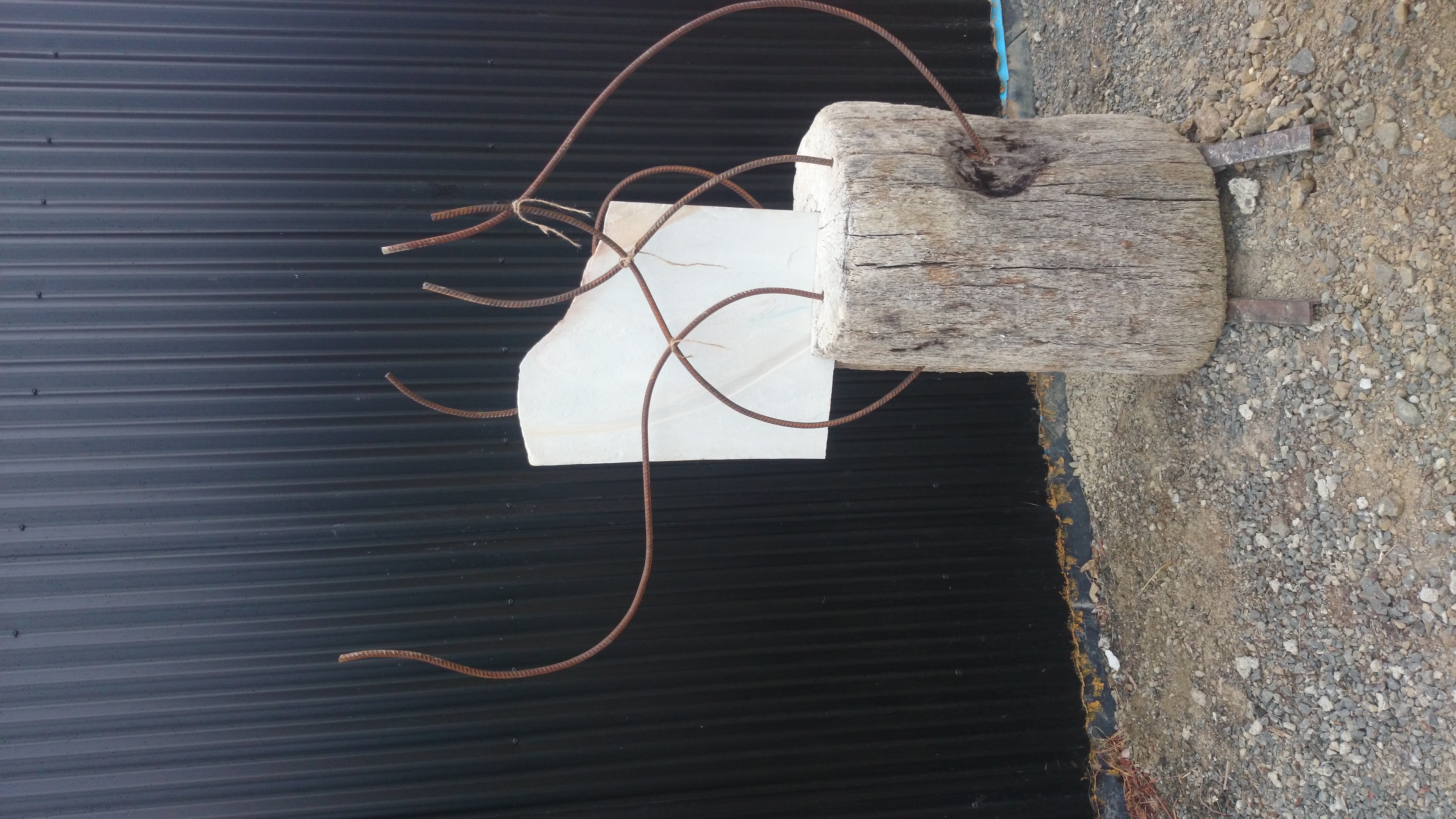 rising carved sandstone, driftwood and s