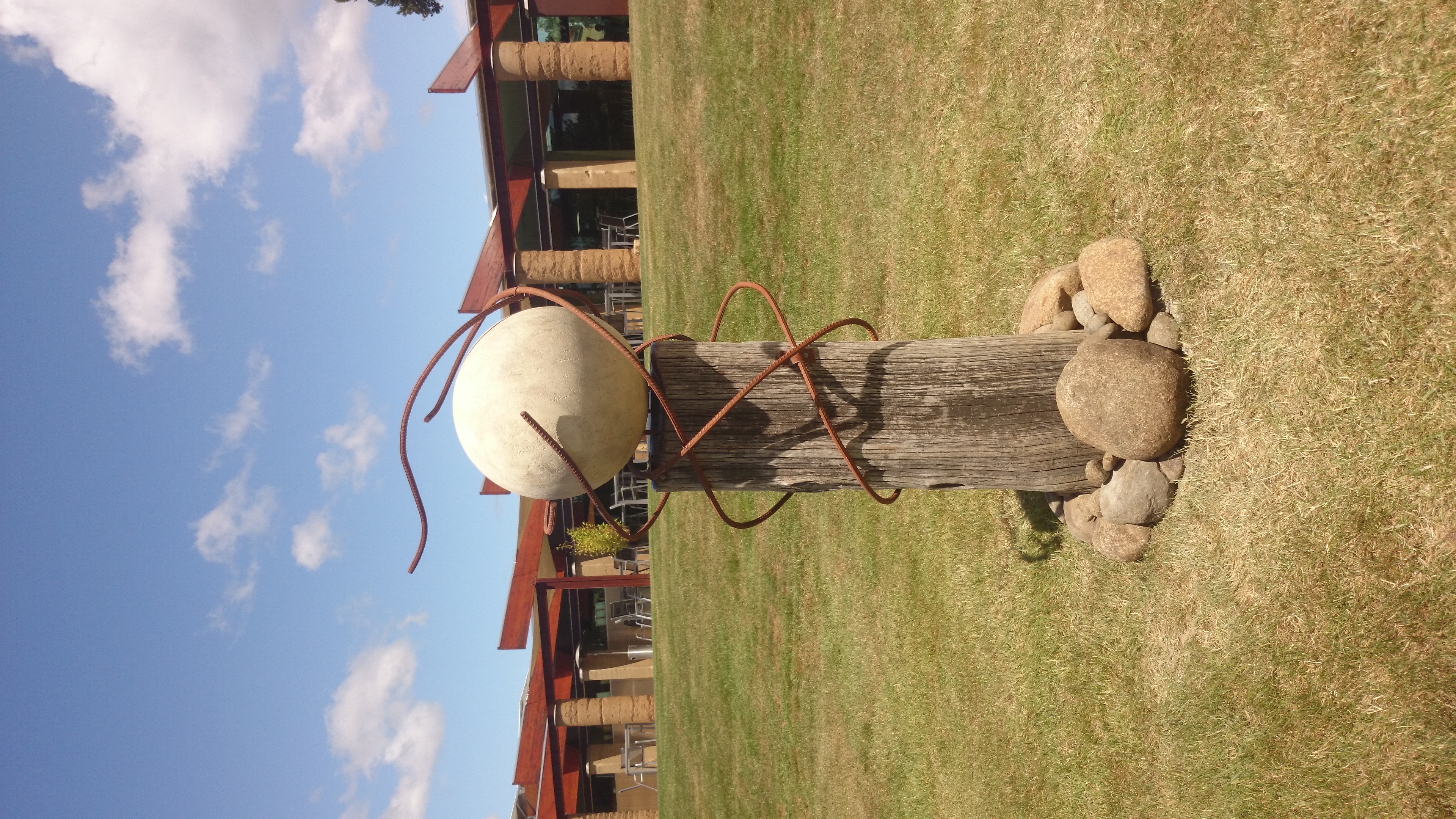 stone ball sculpture homehill winery huo
