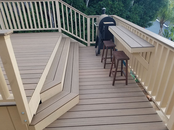 Redwood handrail with solid coverage stain and table .jpg