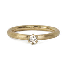 Goldring mit Brillant in einer Krappenfassung