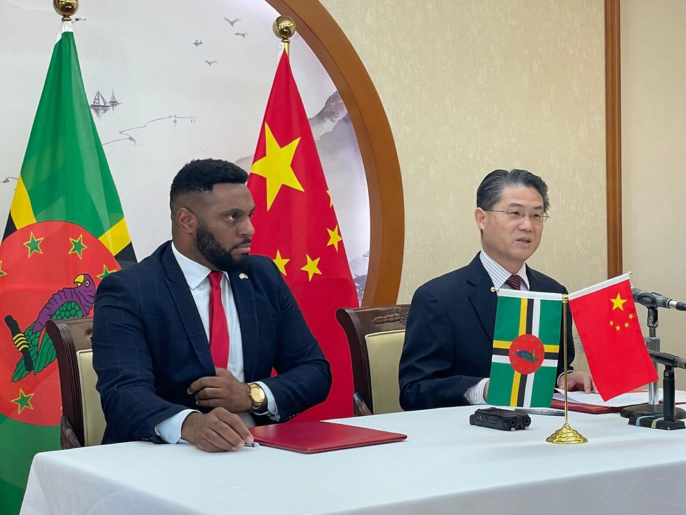 Health Minister Cassanni Laville and Chinese Ambassador to Dominica Chu Maoming