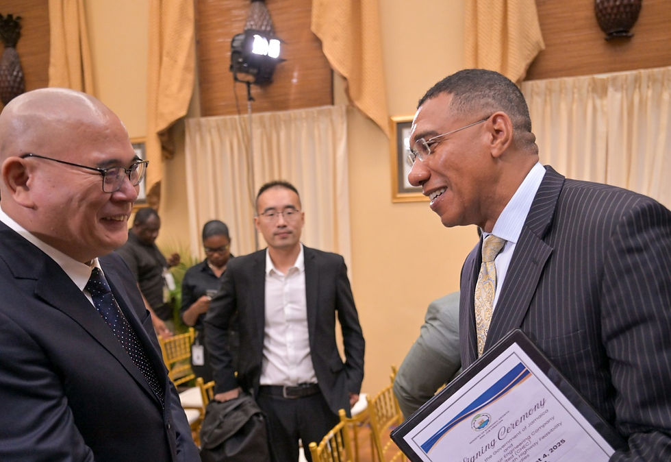 Prime Minister Hon. Andrew Holness and Project Manager CHEC Hongsheng Gui at signing ceremony on Aug 4