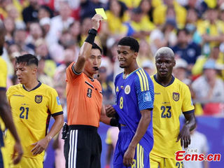 Chinese referees take World Cup stage