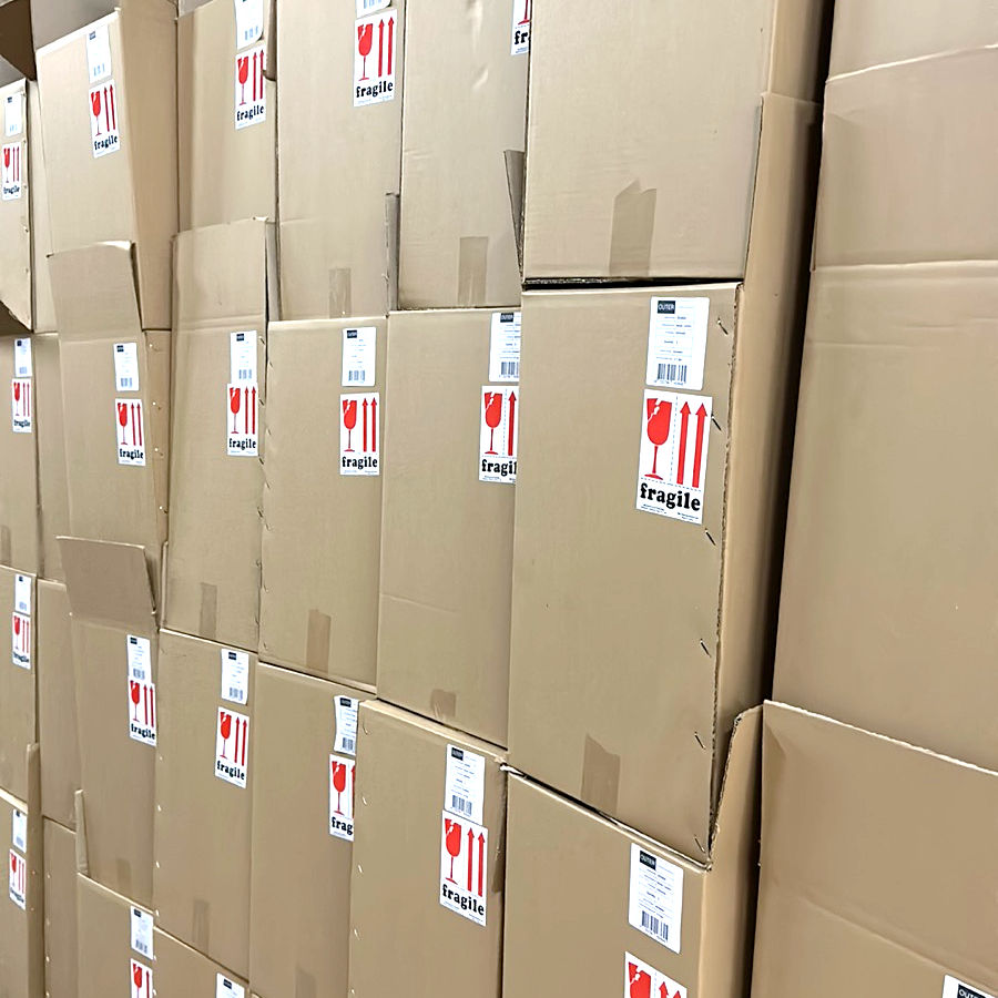 carton box packing at classic home factory with fragile label