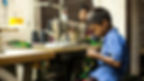 child sewing