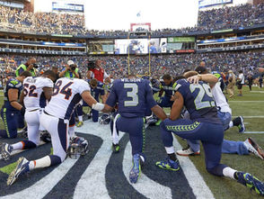 Seahawks and Bears praying together