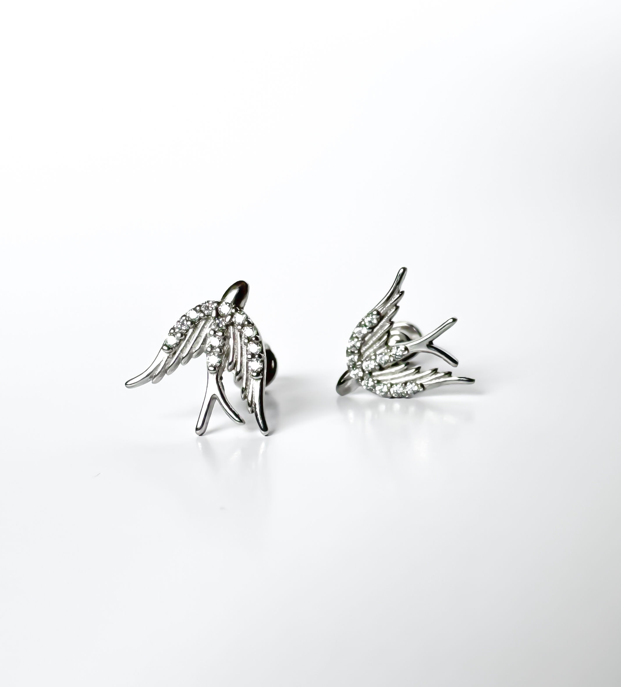 Silver earrings “White swallows”
