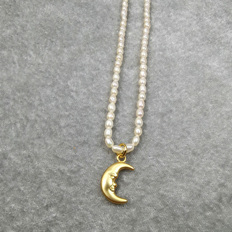 Thumbnail: Crescent Moon Pearls Necklace