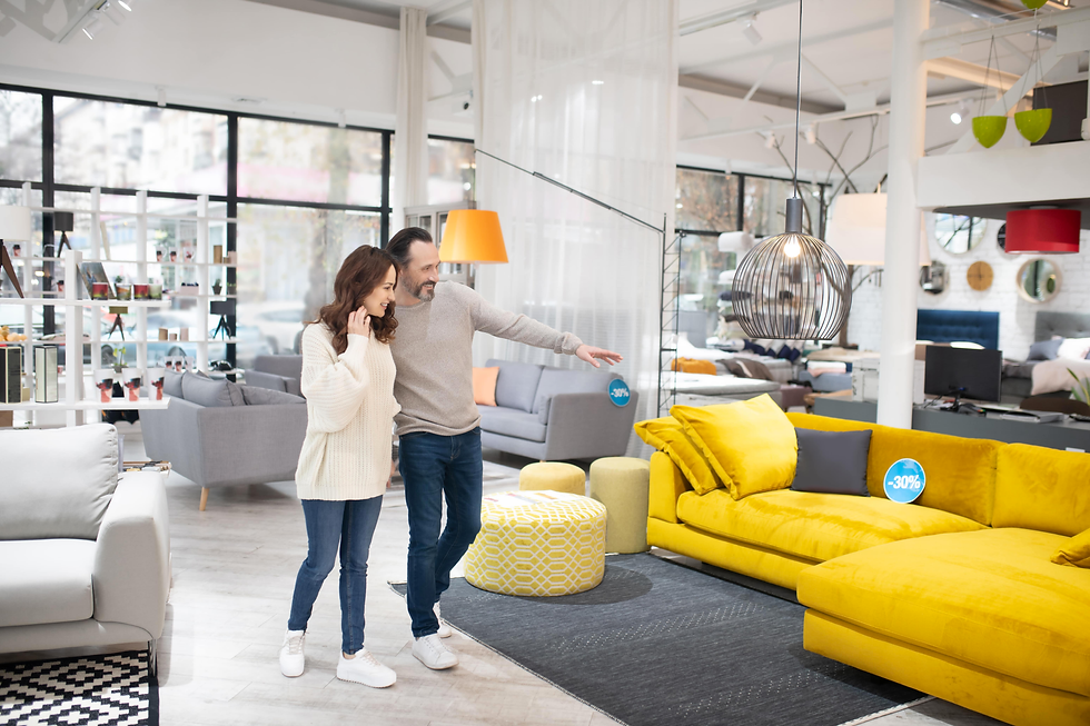 Man and woman shopping for furniture in a furniture store