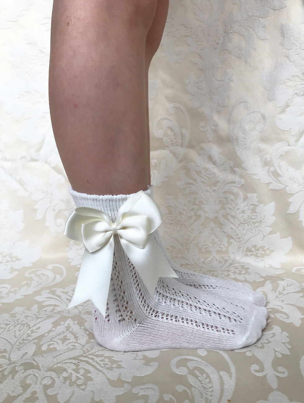 Thumbnail: Baby and girls openwork ankle socks with bows in ivory cream