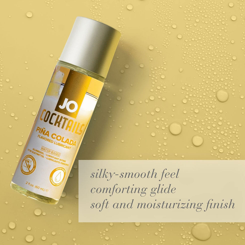 JO Pina Colada flavoured lubricant bottle on a yellow background with water droplets.