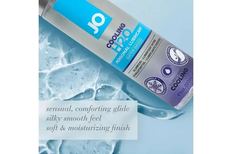 JO H2O cooling lubricant bottle resting on ice against a blue background.