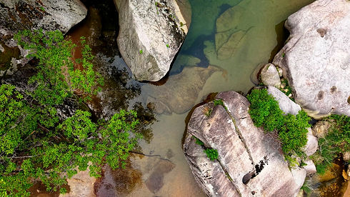Aerial Drone Footage of a Clear Mountain Stream Flowing Through Mungyeong Countryside in L