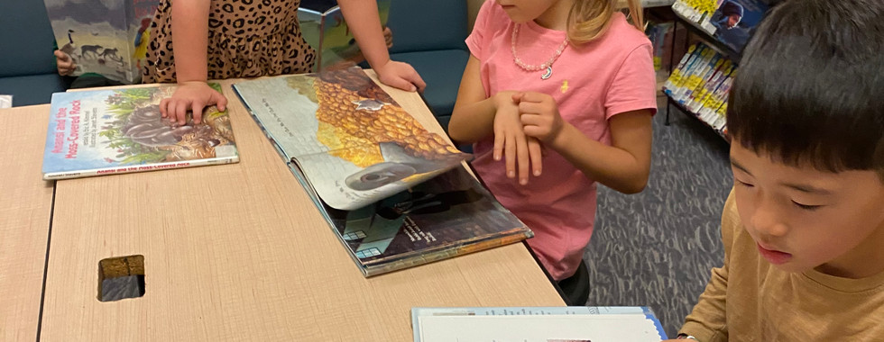 children reading together