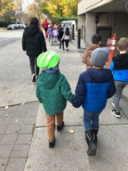 two kids holding hands