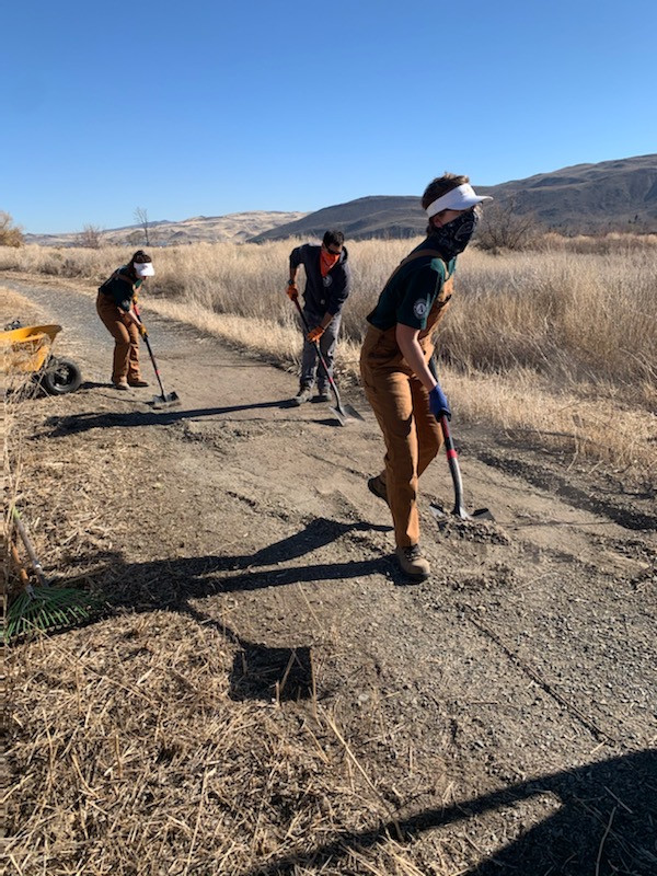 AmeriCorps Wetland Restoration Technicians enhancing the trail