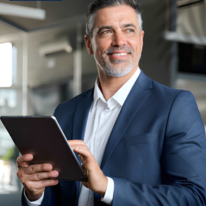 Confident business leader guiding tech transformation, building digital confidence with AI dashboards.