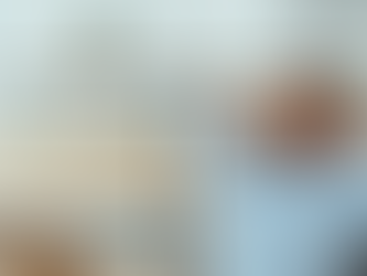 Leader modeling work-life balance by leaving office on time, demonstrating healthy boundaries to team in a collaborative workspace