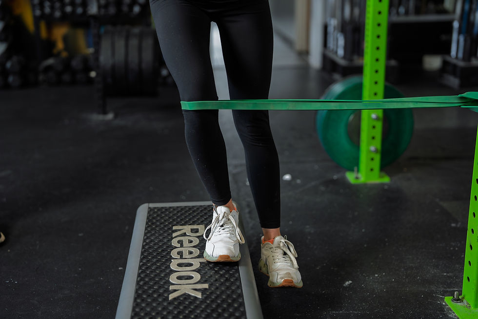 A patient using a band for leg training.