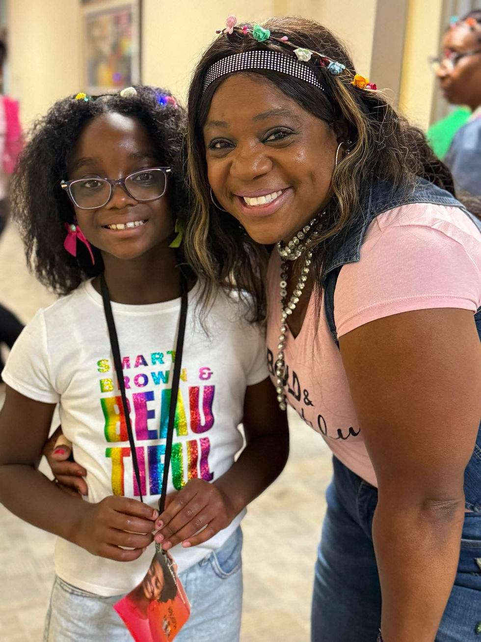 Committee Chair Lavon with a young vendor
