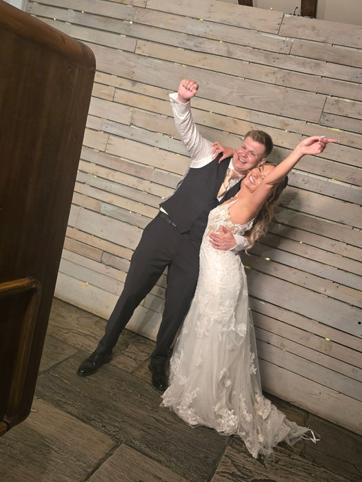Bride and groom pose