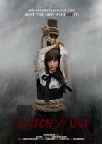 Witch Hunt campaign poster featuring a bound woman beneath the line “She never feared the fire. Just the men who lit it.”