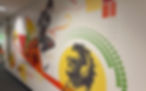 Colourful custom office wall mural featuring illustrated artwork, abstract graphics and creative workplace branding.