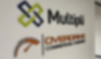 Acrylic office signage displaying multiple company logos and branding.