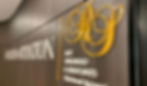 Corporate reception signage Sydney featuring metallic logo and dimensional lettering