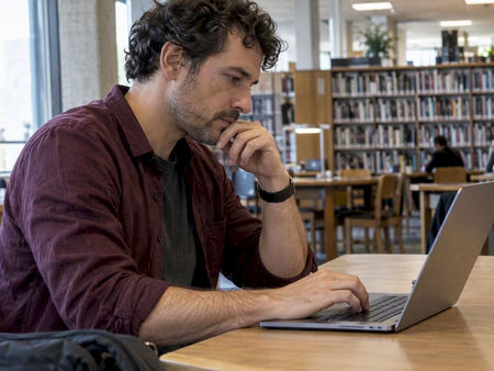 Photographer reviewing ICM contest calls online