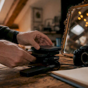 Photographer preparing digital images for grant submission