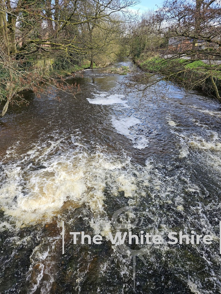 High angle view of the River Aire flowing through a Yorkshire town