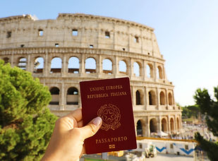 hand-holding-italian-passport-front-colosseum-rome.jpg