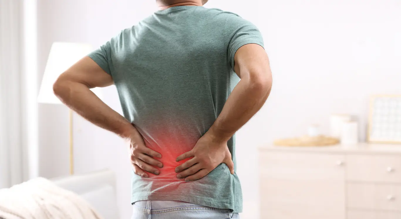 Man suffering from chronic back pain can be treated with hypnosis