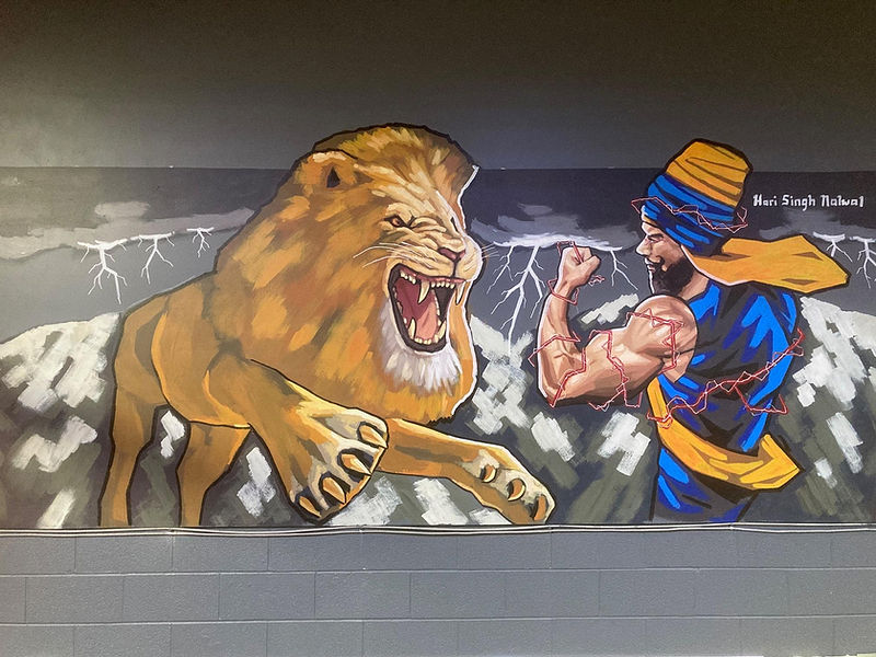 Custom artwork in a fitness facility. Gym decor.