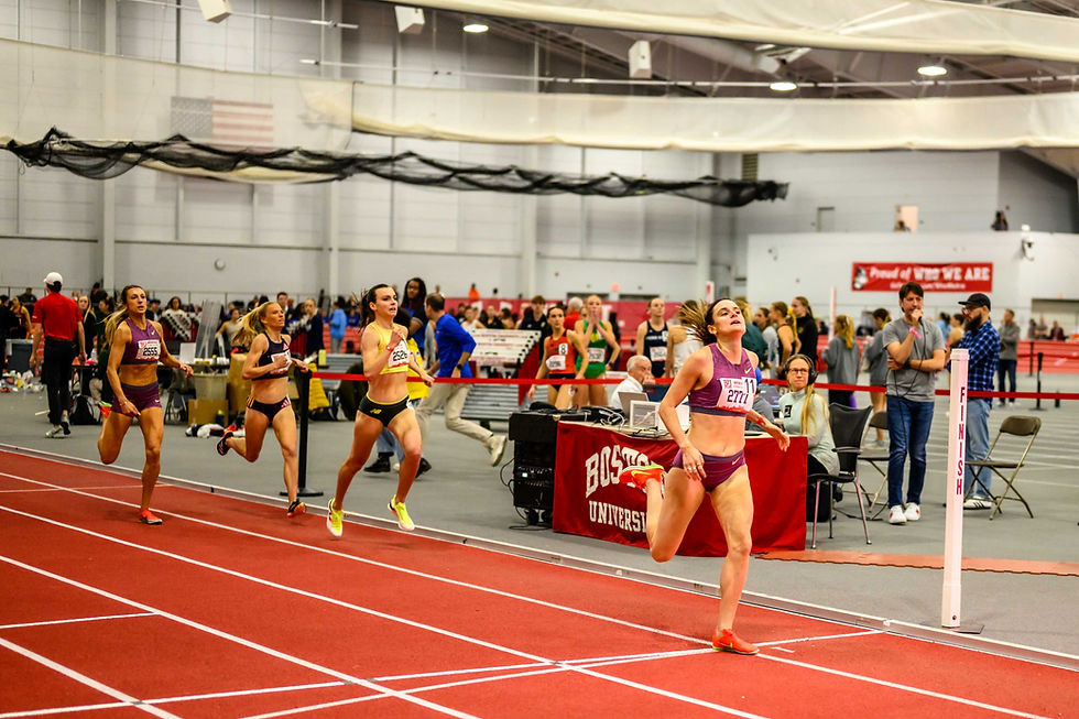 Lucia Stafford winning the women's one mile race